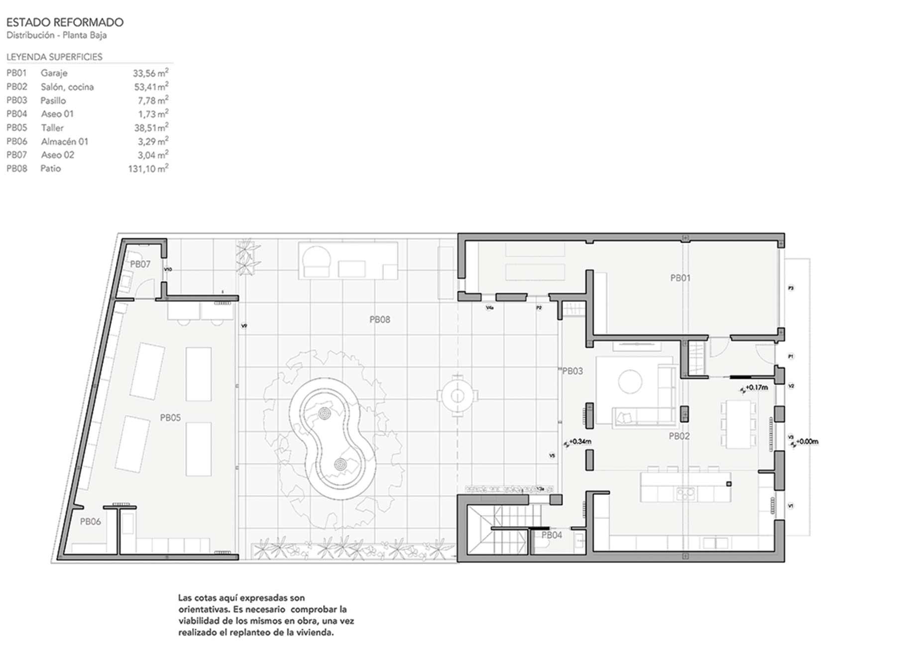 Plano de planta baja reformada con salón cocina, taller, garaje y patio en vivienda unifamiliar rehabilitada en Madrid